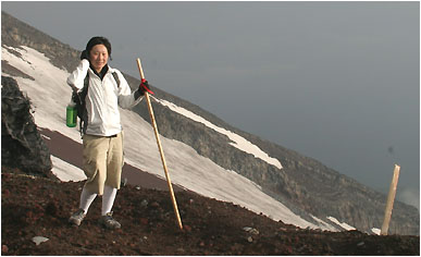 descending mt fuji with my walking stick and tube socks