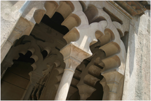 muslim arches at the alcazaba of malaga
