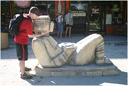 nick caressing chac mool right outside tulum