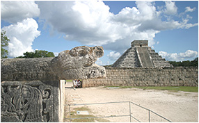 serpent's head (from the platform of the eagles) and the castillo at chichen itza