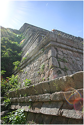 view of the great pyramid at uxmal from below