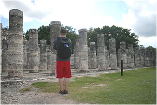nick trying to fit in at the temple of the warriors at chichen itza